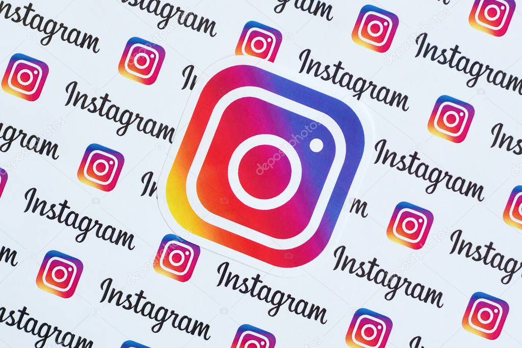 NY, USA - DECEMBER 5, 2019: Instagram pattern printed on paper with small instagram logos and inscriptions. Instagram is American photo and video-sharing social networking service owned by Facebook