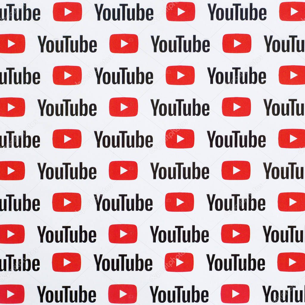 NY, USA - DECEMBER 5, 2019: Youtube pattern printed on paper with small youtube logos and inscriptions. YouTube is Google subsidiary and American most popular video-sharing platform