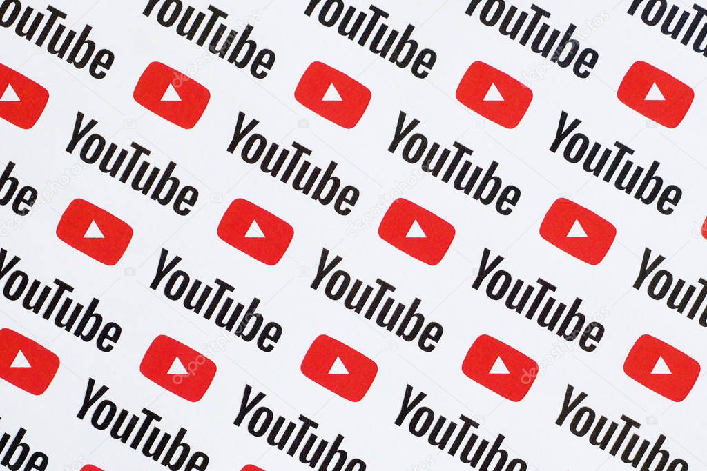 NY, USA - DECEMBER 5, 2019: Youtube pattern printed on paper with small youtube logos and inscriptions. YouTube is Google subsidiary and American most popular video-sharing platform
