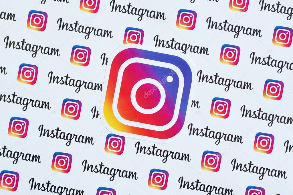 NY, USA - DECEMBER 5, 2019: Instagram pattern printed on paper with small instagram logos and inscriptions. Instagram is American photo and video-sharing social networking service owned by Facebook