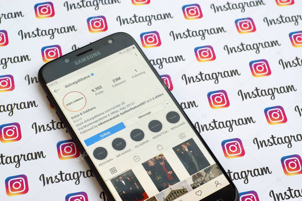 NY, USA - DECEMBER 4, 2019: Dolce and Gabbana official instagram account on smartphone screen on paper instagram banner.