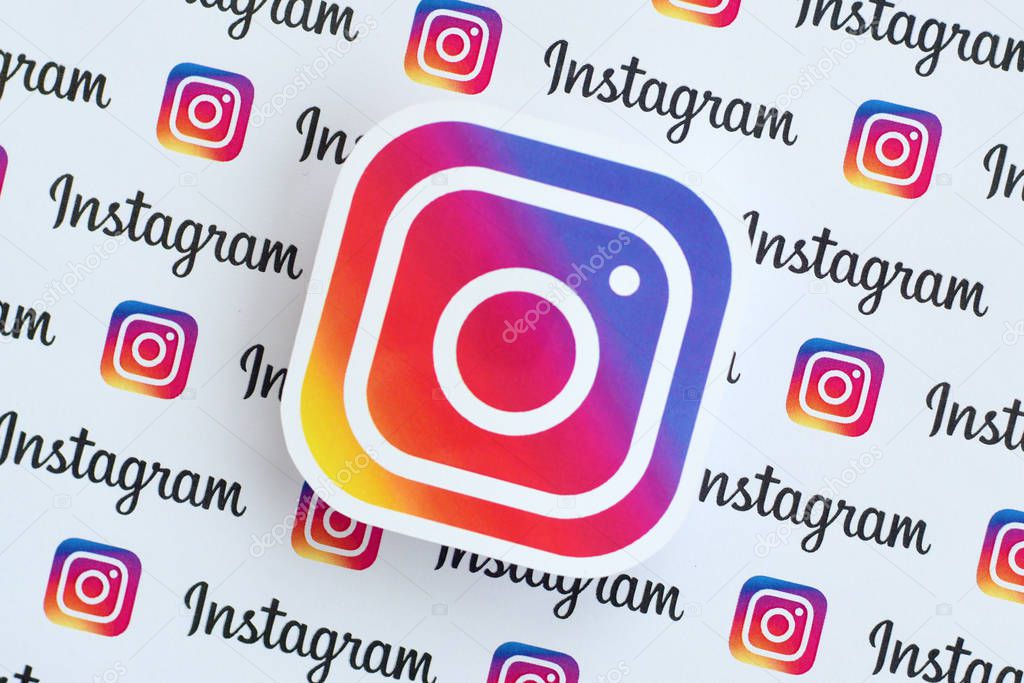NY, USA - DECEMBER 5, 2019: Instagram pattern printed on paper with small instagram logos and inscriptions. Instagram is American photo and video-sharing social networking service owned by Facebook