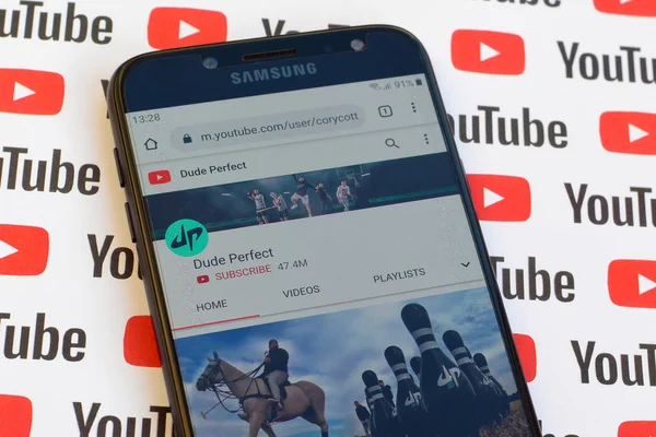 Dude Perfect official youtube channel on smartphone screen on pa — Stock Photo, Image