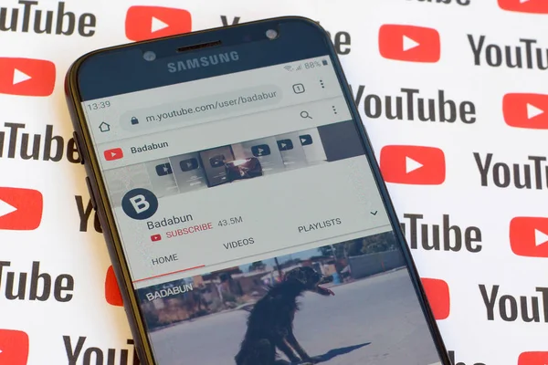 Badabun official youtube channel on smartphone screen on paper y — Stock Photo, Image