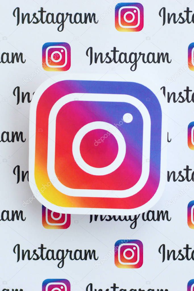 NY, USA - DECEMBER 5, 2019: Instagram pattern printed on paper with small instagram logos and inscriptions. Instagram is American photo and video-sharing social networking service owned by Facebook