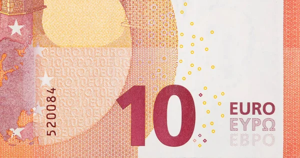 Fragment part of 10 euro banknote close-up with small red details — Stock Photo, Image