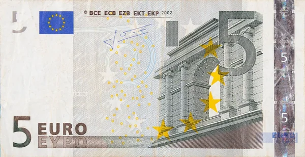 Фрагментная часть банкноты 5 евро крупным планом с мелкими коричневыми деталями — стоковое фото