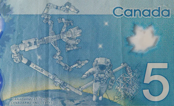 Dextre and canadarm2 on Canada 5 Dolars 2013 Полімер Банкнот фрагмент — стокове фото