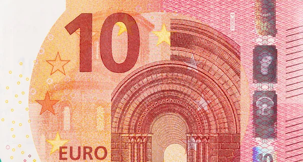 Fragment část 10 eurobankovky zblízka s drobnými červenými detaily — Stock fotografie