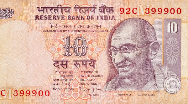 Mahatma Gandhi twarz na indyjskim banknocie dziesięć rupii. 10 rupii waluty krajowej Indii — Zdjęcie stockowe