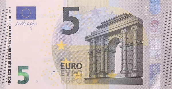 Moneda de financiación de billetes de cinco euros primer plano detalle fragmento de dinero —  Fotos de Stock