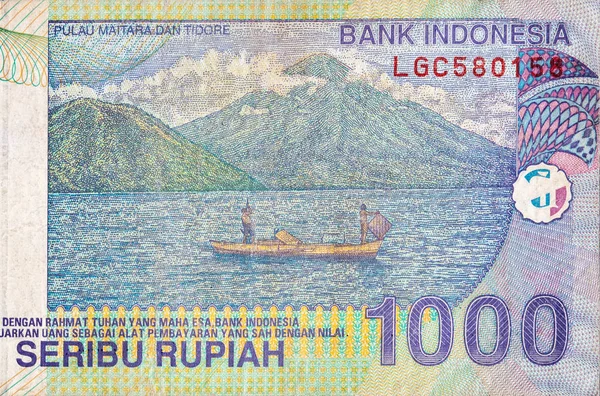 Pulau Maitara Dan Tidore о банкноте Индонезии 1000 рупий, бывшая валюта Индонезии — стоковое фото