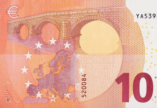 Fragmentteil einer 10-Euro-Banknote in Nahaufnahme mit kleinen roten Details — Stockfoto