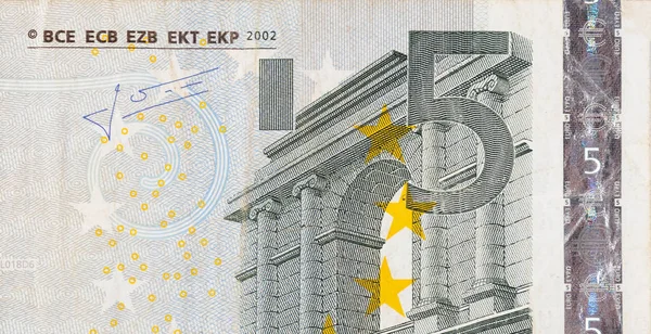 Fragment del av 5 eurosedlar närbild med små bruna detaljer — Stockfoto