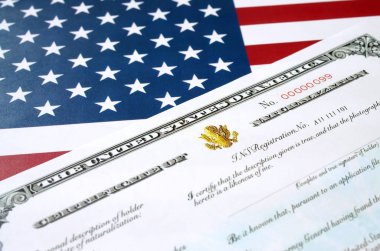 N-550 United States Naturalization Certificate of citizenship on USA flag clipart