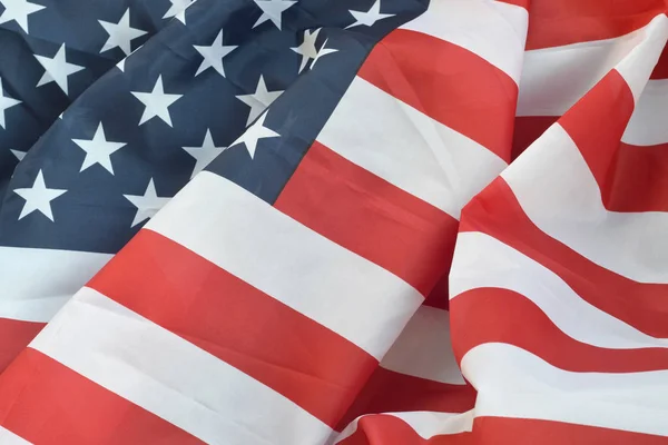 Amerikai Egyesült Államok hullámzó zászló sok hajtogatott — Stock Fotó