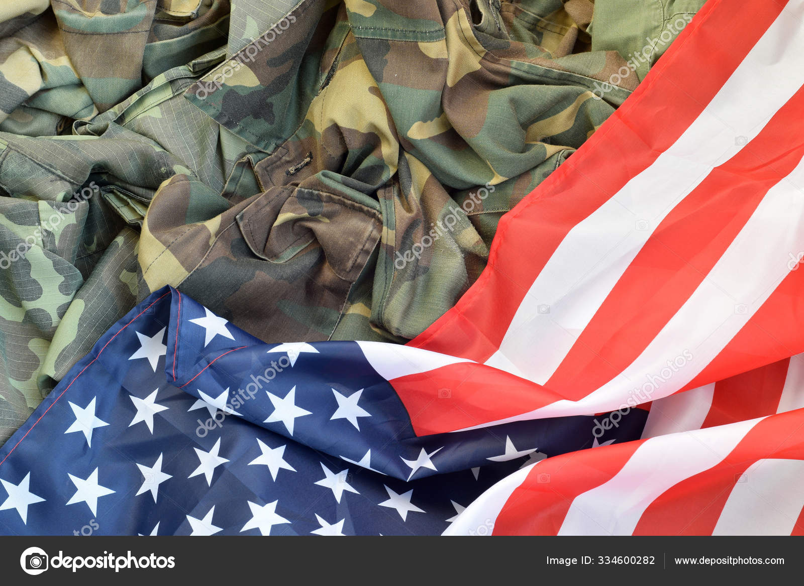 United States of America flag and folded military uniform jacket. Military  symbols conceptual background banner for american patriotic holidays Stock  Photo by ©Mehaniq 334600282
