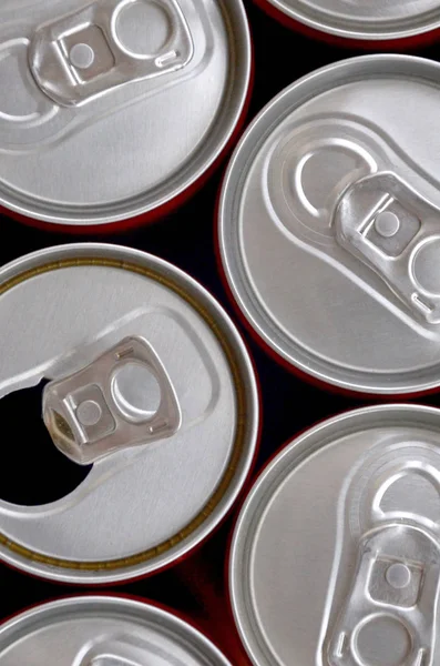 Many cans of soda soft drink or energy drink containers. A lot of recycled cans made from aluminum and being prepared for re-production. — Stock Photo, Image