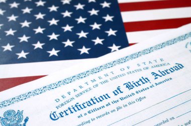 Fs-545 Certification of birth abroad lies on United States flag from US Foreign service clipart