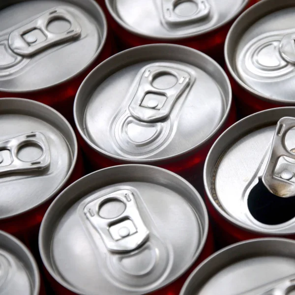 Many aluminium soda drink cans. Advertising for Soda drinks or tin cans mass manufacturing