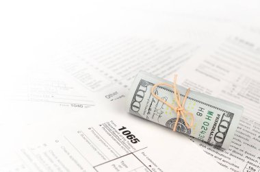 1065 A.B.D. Gelir Gelirleri formunun Amerikan rulosu ile iadesi.