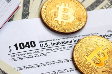 Kalem, bitcoins ve dolar faturaları 1040 vergi formu üzerinde yalan olduğunu 