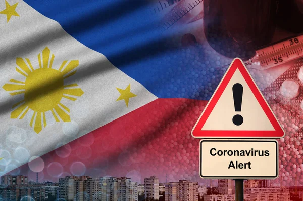 Philippines flag and Coronavirus 2019-nCoV alert sign. Concept of high probability of novel coronavirus outbreak through traveling tourists