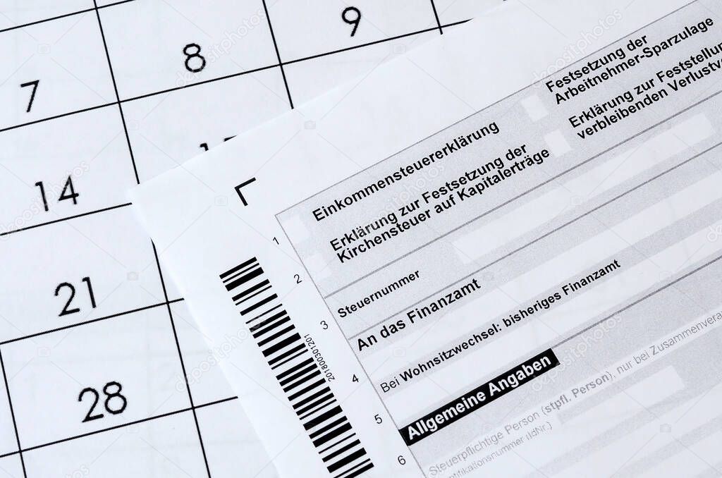 German tax form lies on office calendar. Concept of tax paying i