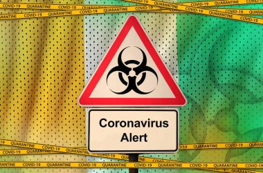 Fildişi sahili bayrağı ve turuncu bantlı Covid-19 biyolojik tehlike sembolü. Coronavirus veya salgın 2019-nCov virüs konsepti