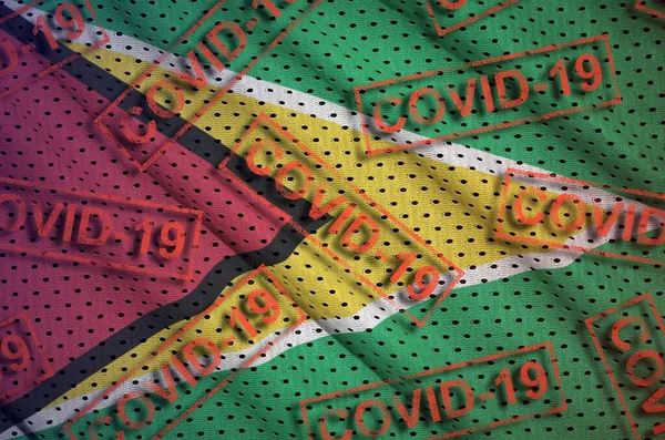 Guyana Flag Many Red Covid Stamps Coronavirus Pandemic 2019 Ncov — Stock Photo, Image