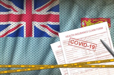 Fiji bayrağı ve 19 damgalı sağlık sigortası talep formu. Coronavirus veya salgın 2019-nCov virüs konsepti