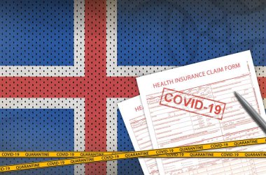 İzlanda bayrağı ve 19 damgalı sağlık sigortası talep formu. Coronavirus veya salgın 2019-nCov virüs konsepti
