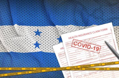 Honduras bayrağı ve 19 damgalı sağlık sigortası talep formu. Coronavirus veya salgın 2019-nCov virüs konsepti