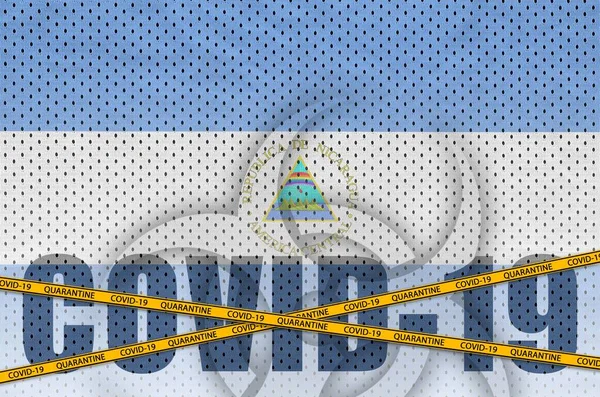 Прапор Нікарагуа Напис Ковід Помаранчевою Карантинною Стрічкою Coronavirus Або Pandemic — стокове фото