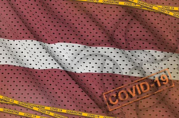 拉脱维亚国旗和Covid 19生物危害标志 带有检疫橙色带子和印章 Coronavirus Pandemic 2019 Ncov Virus Concept — 图库照片