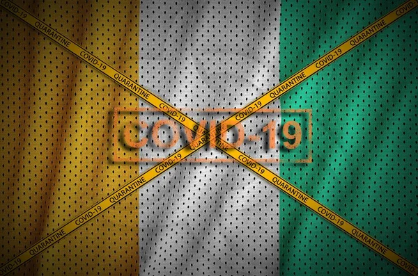Bandeira Costa Marfim Selo Covid Com Fita Laranja Quarentena Conceito — Fotografia de Stock