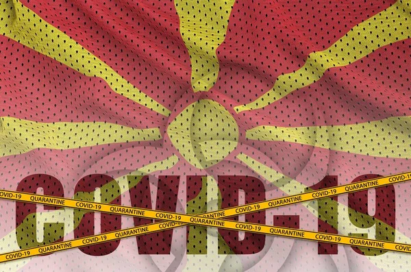 Bandera Macedonia Inscripción Covid Con Cinta Frontera Cuarentena Naranja Concepto — Foto de Stock