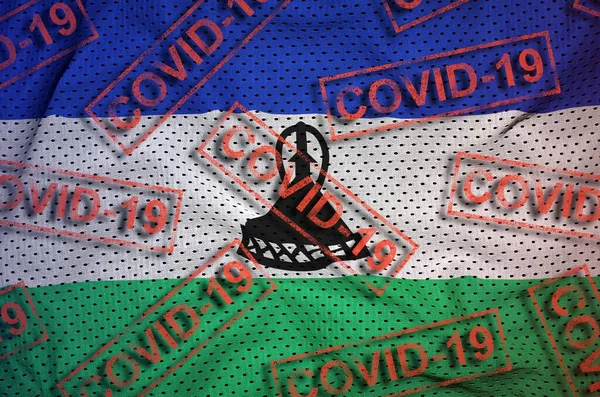 Lesotho Flag Many Red Covid Stamps Coronavirus Pandemic 2019 Ncov — Stock Photo, Image