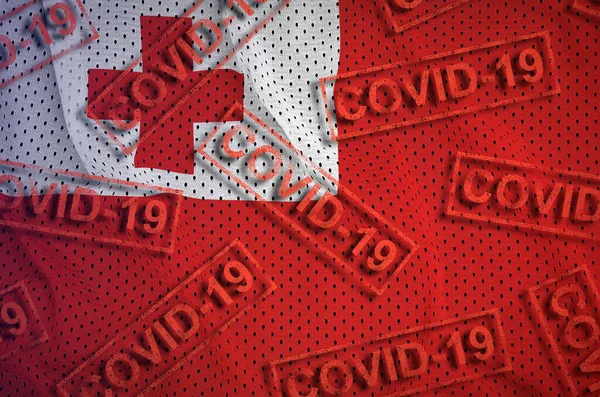 Σημαία Τόνγκα Και Πολλά Κόκκινα Γραμματόσημα Covid Ιός Του Κερατοειδούς — Φωτογραφία Αρχείου