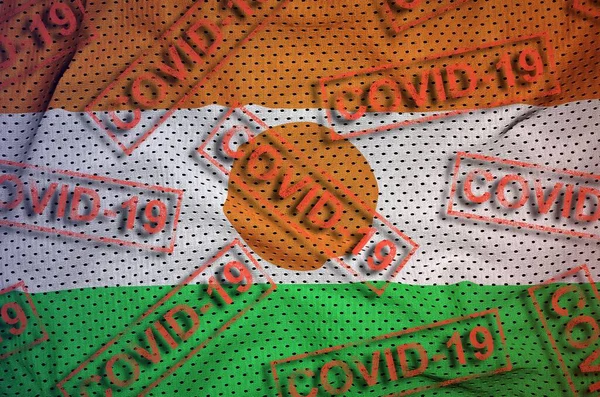 尼日尔国旗和许多红色Covid 19邮票 Coronavirus Pandemic 2019 Ncov Virus Concept — 图库照片