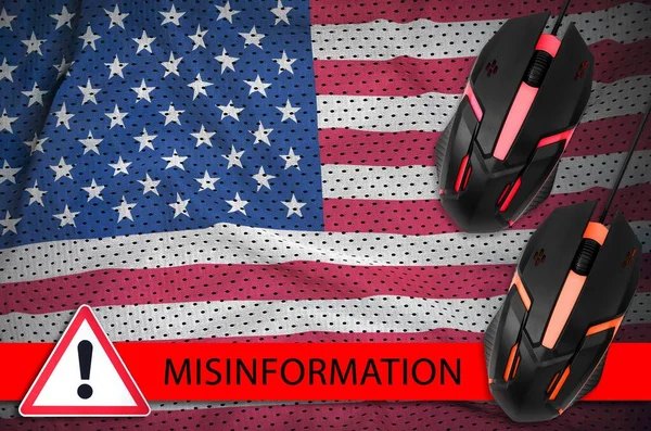 United States of America flag and two computer mouses. Misinformation during Coronavirus or pandemic 2019-nCov virus concept