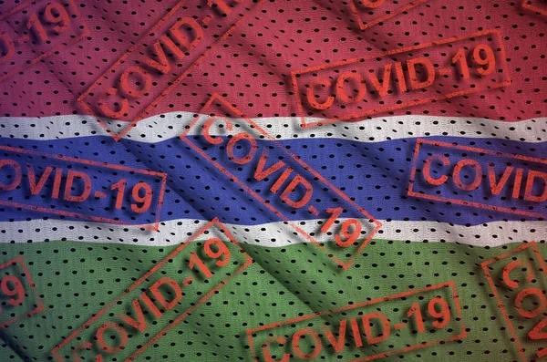 Gambia Flagga Och Många Röda Covid Stämplar Coronavirus Eller Pandemi — Stockfoto