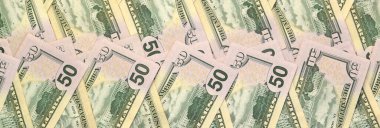 Düz zemin üzerinde 150 dolarlık banknotlar yakın plan. Düz manzaralı. Soyut başarı ya da iş konsepti