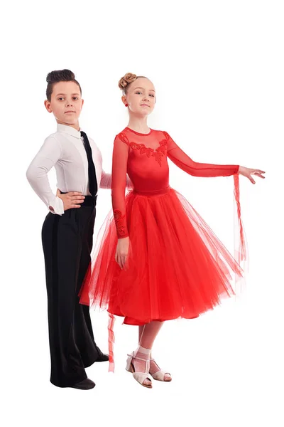 Lovely little boy and girl dancing. Isolated on white background — Stock Photo, Image