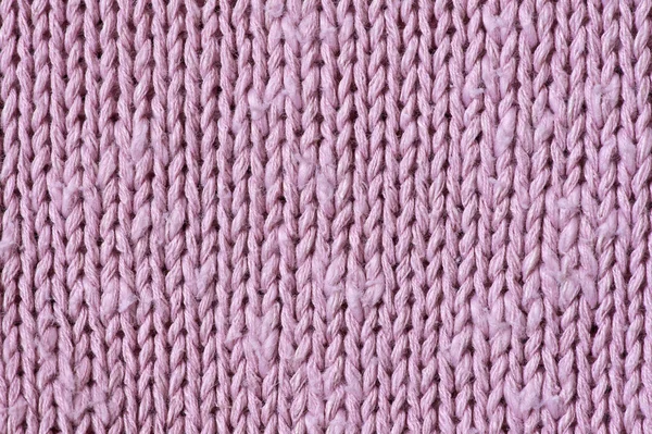 Texture of pink knitted fabric — Stock Photo, Image