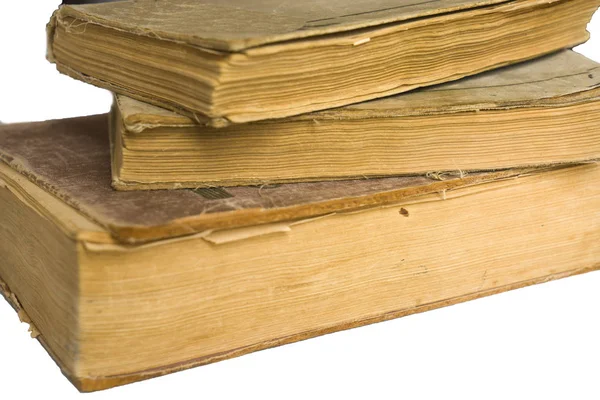 Pila di vecchi libri antichi grandi isolati su sfondo bianco — Foto Stock