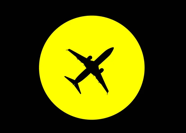 Black silhouette of the plane against the yellow sun in the dark sky — Stock Photo, Image