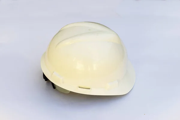 Plastic hard white safety helmet on white background. — Stock Photo, Image