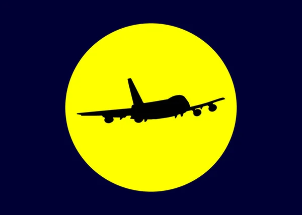 Чорний силует літака на тлі жовтого сонця в темному небі — стокове фото