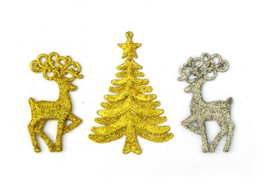 multicolored Christmas reindeer and Christmas trees on a white background.
